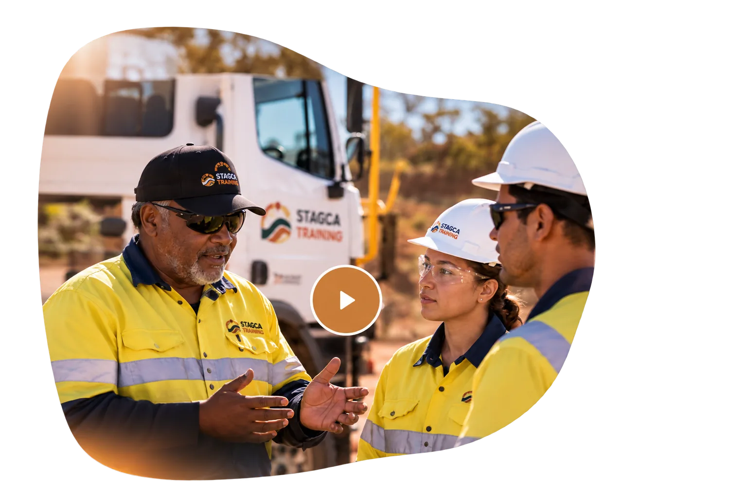 STAGCA trainers coaching operators beside a truck
